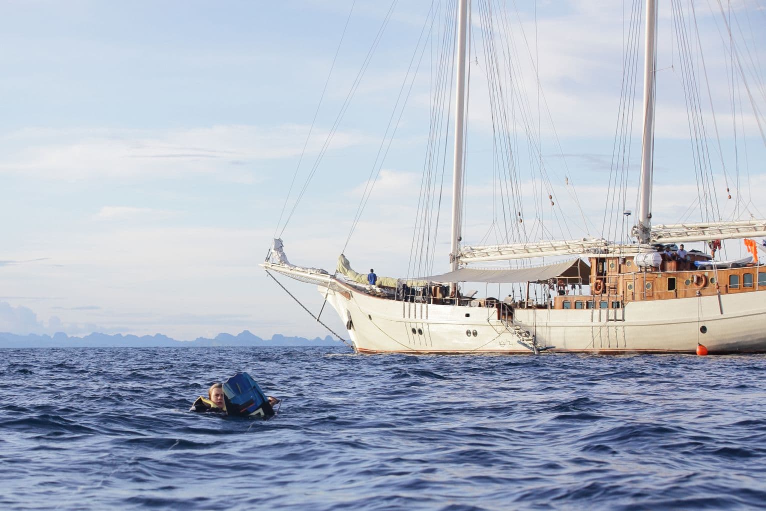 Mutiara Laut Yacht Guest Snorkeling Alongside Hull